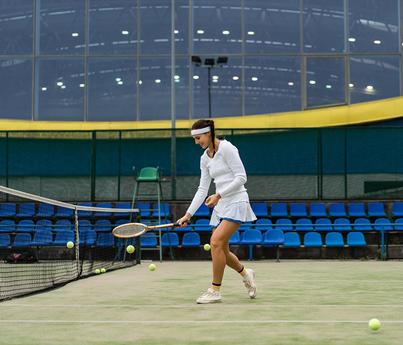Players participating in a tennis clinic
