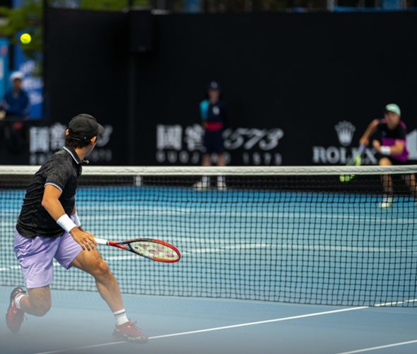 Players competing in a club tennis tournament